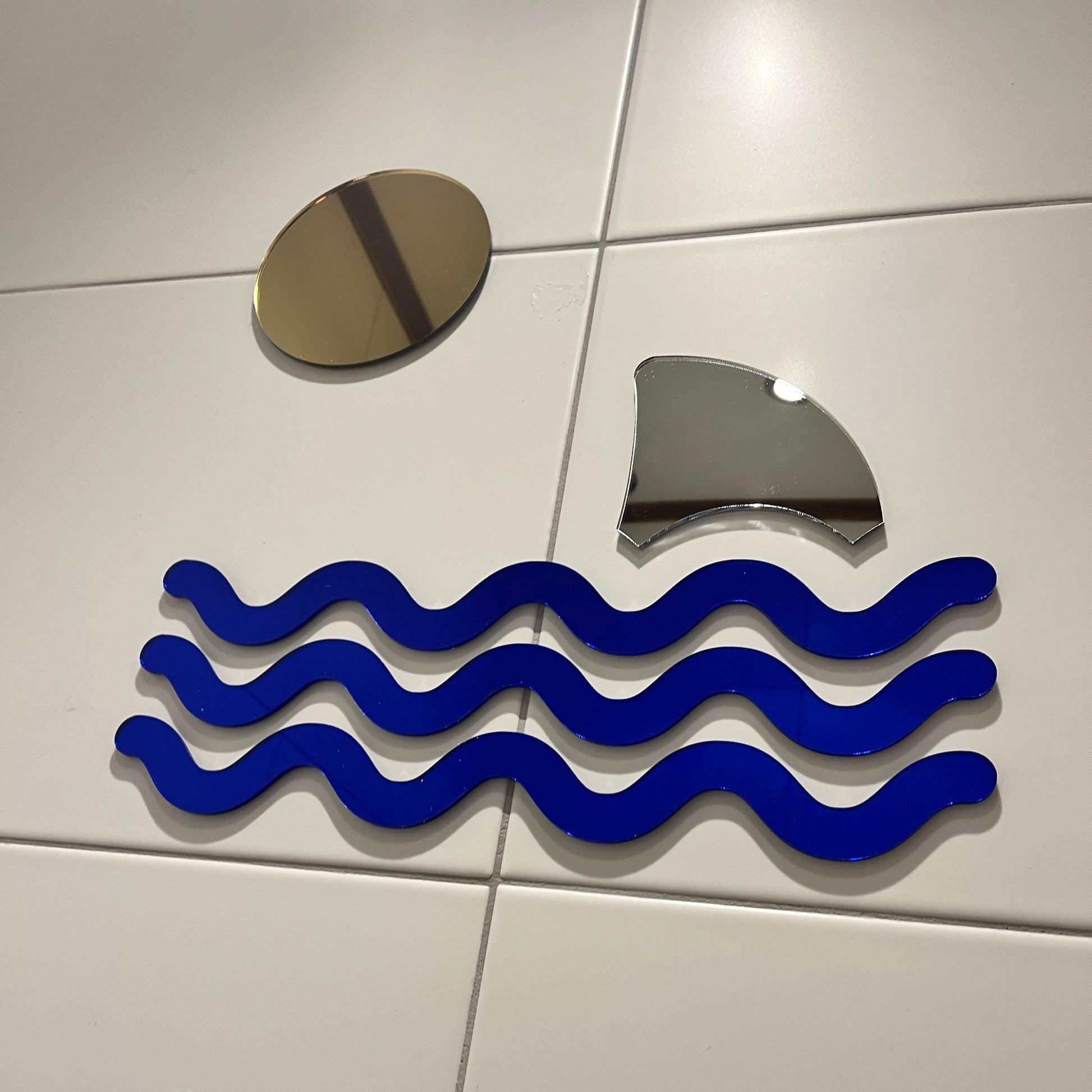 Wild Waters wall art using double-sided nanotape, easy mounting on tiled surfaces.